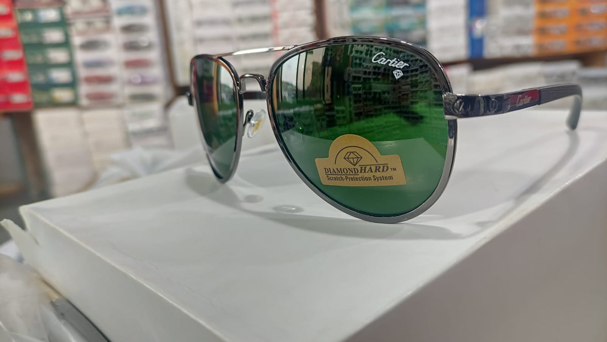 CARTIER GREEN GLASSES WITH SILVER METAL FRAME AND TEMPLES (22132 60-18-135)